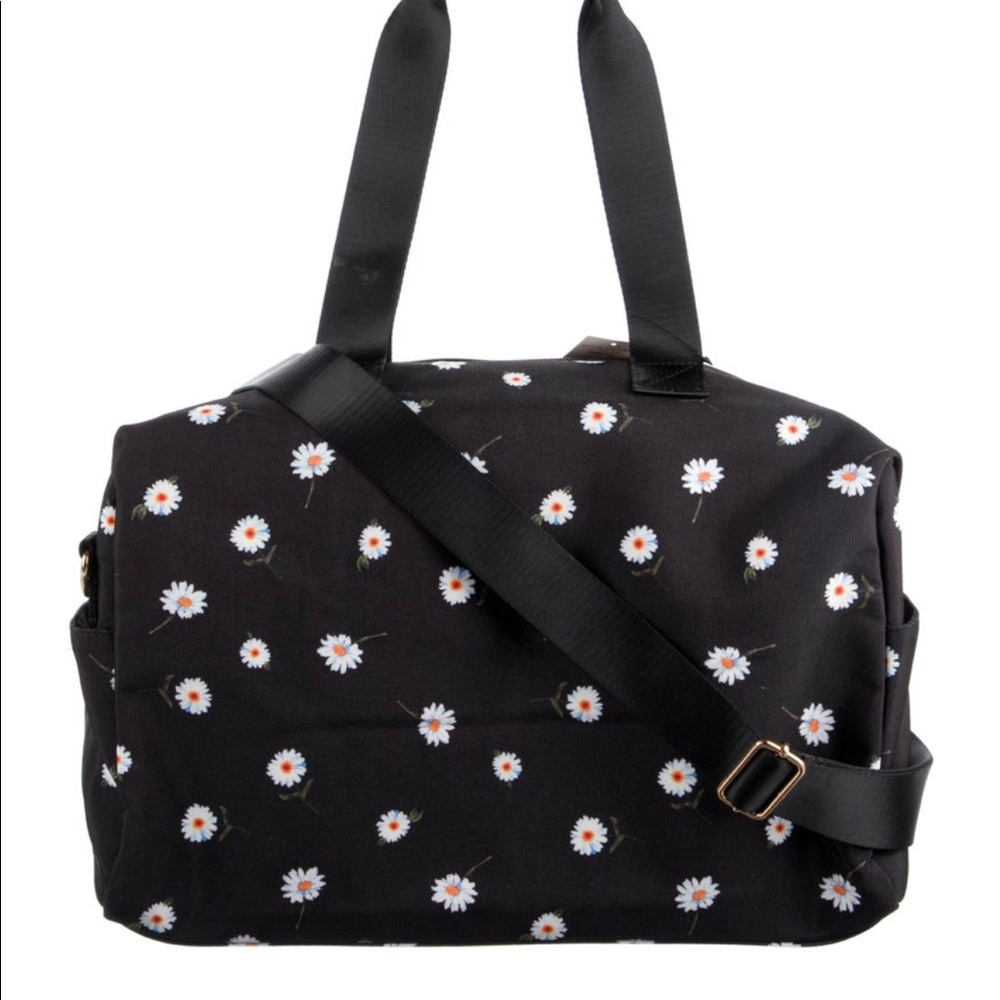 Alice & Olivia daisy duffel bag.